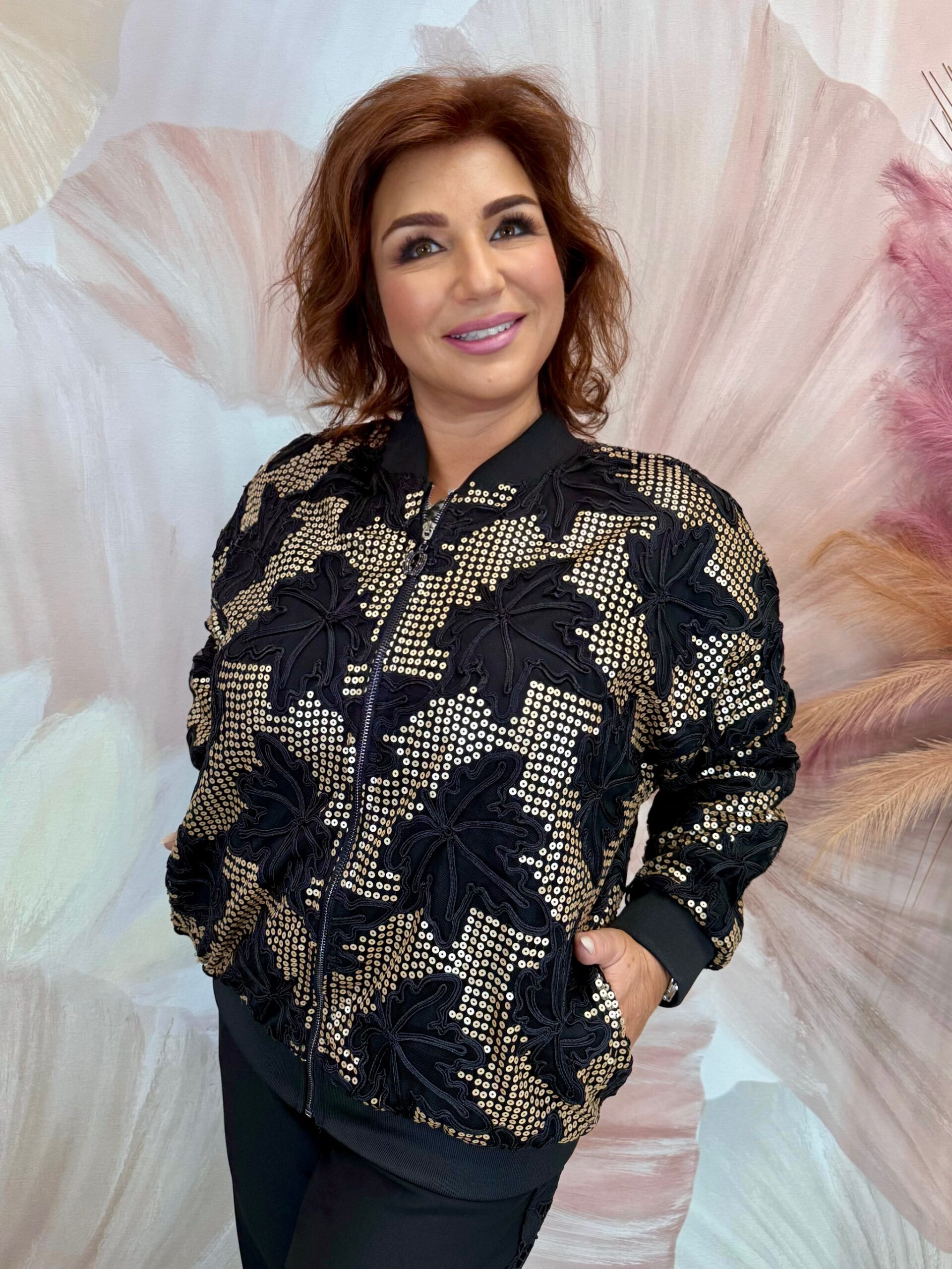 Csinos arany fekete zippes felső