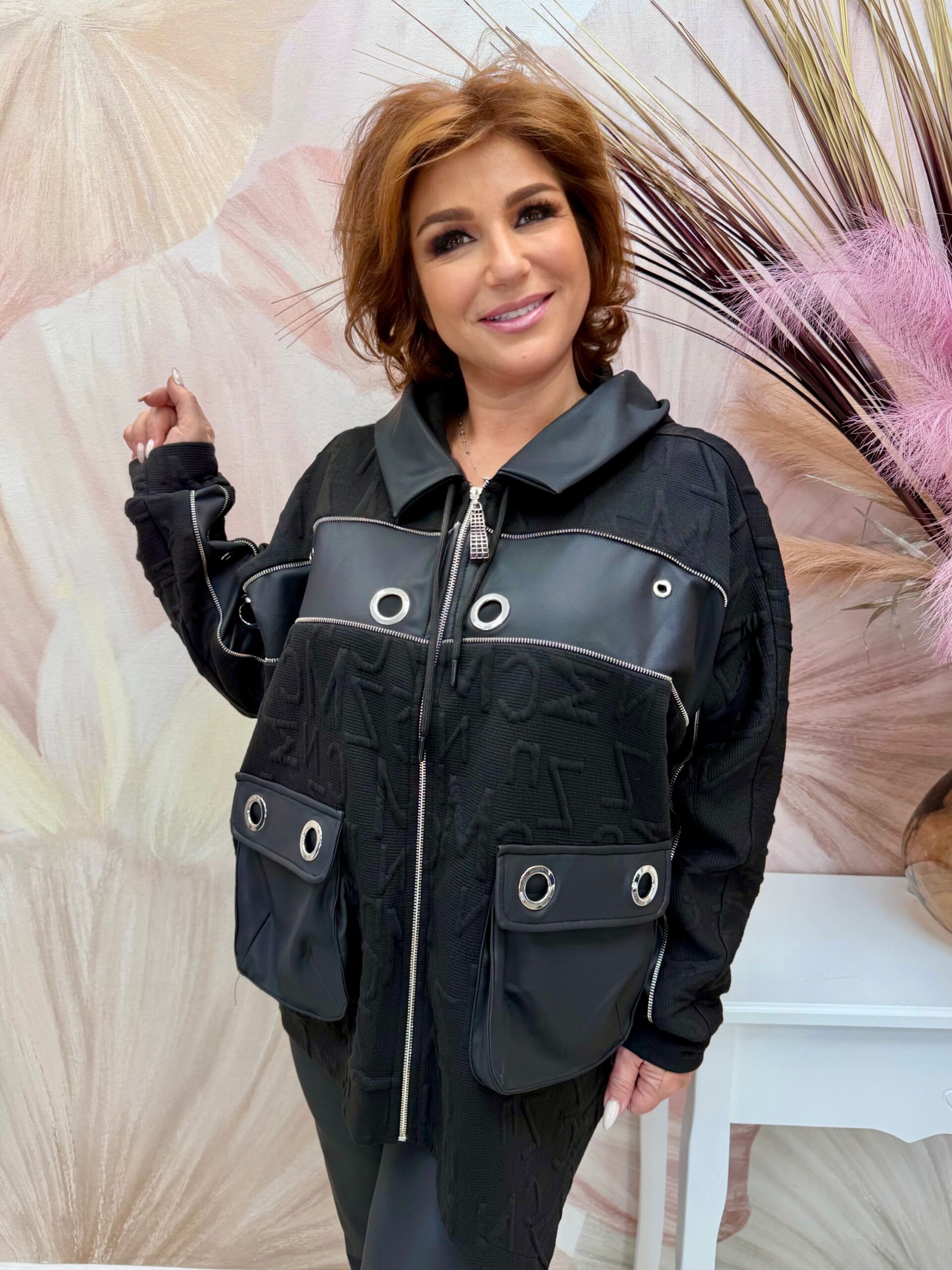 Fekete riglis bőrbetétes dzseki